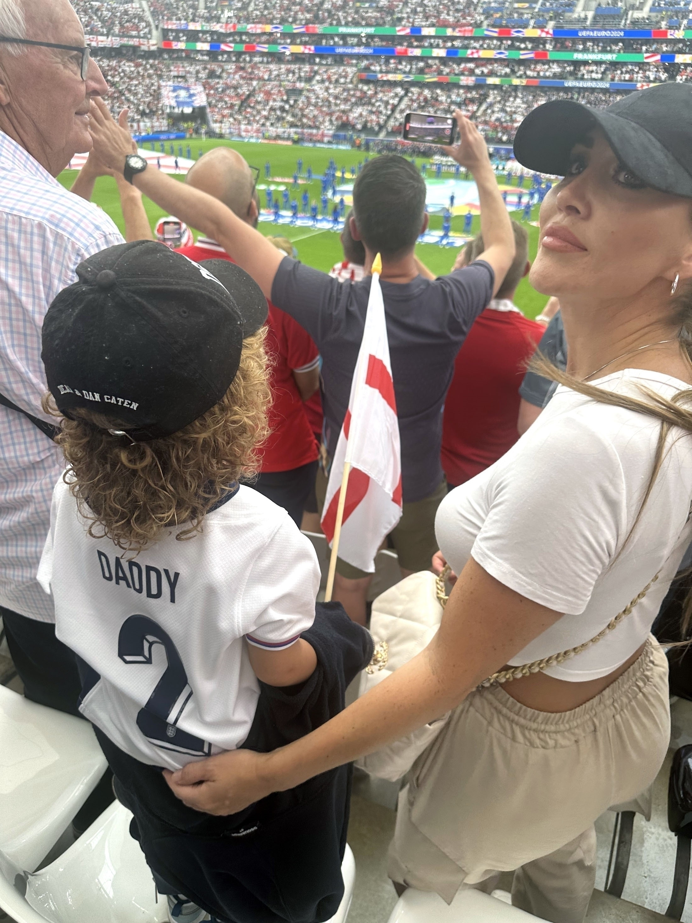 Lauryn and her son Kairo before the Denmark game kicked off