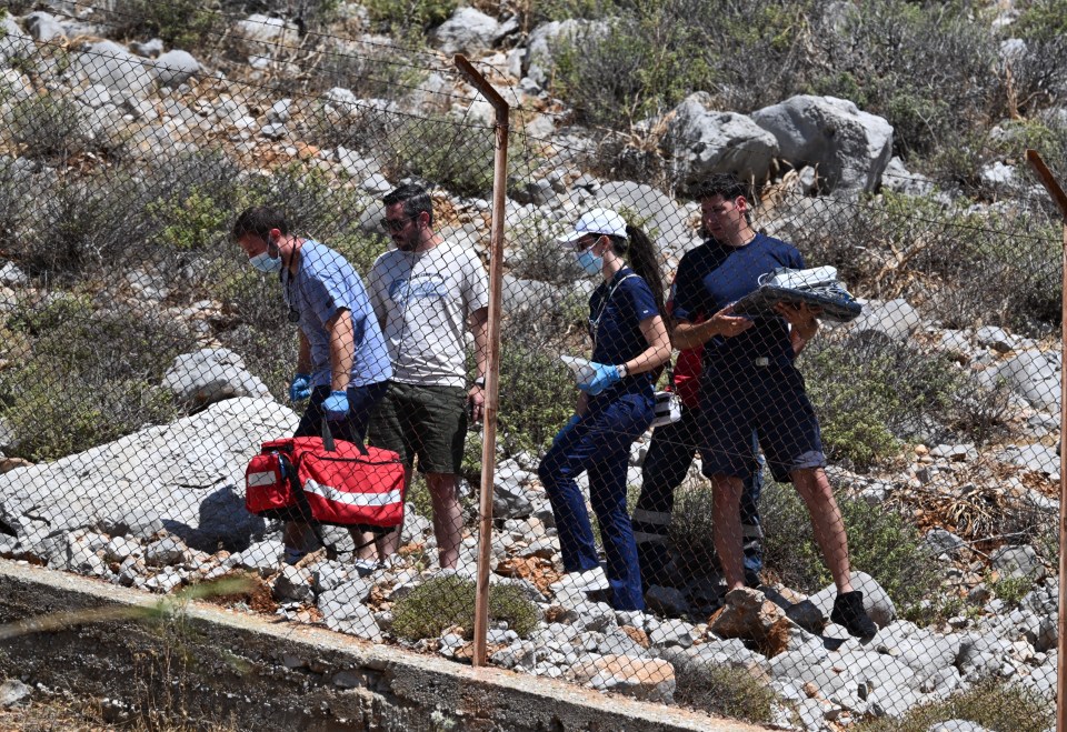 Emergency responders at the scene near the rocky path police feared Dr Mosley had taken