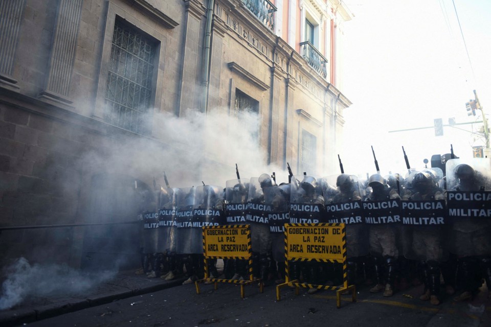 Members of the Bolivian army guard the entrance to Plaza Murillo while President Luis Arce 'denounced the irregular mobilization of some units of the country’s army in La Paz