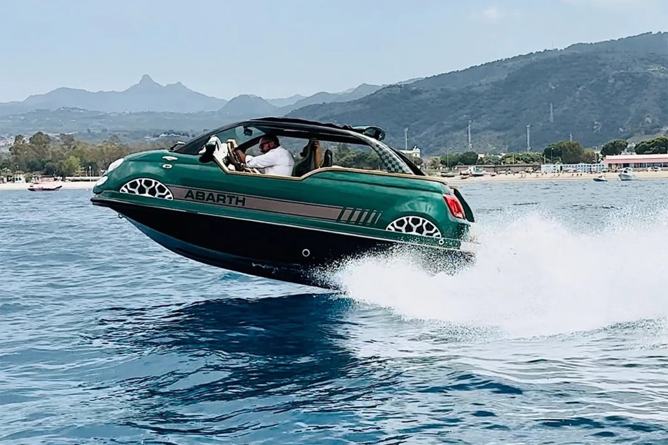 The bizarre vehicle features a 230 horsepower outboard motor