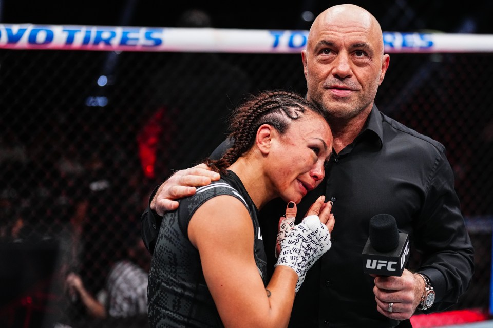 Michelle Waterson-Gomez embraces UFC commentator Joe Rogan after announcing her retirement