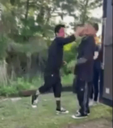 Both band members were seen punching each other in the face in the disturbing footage