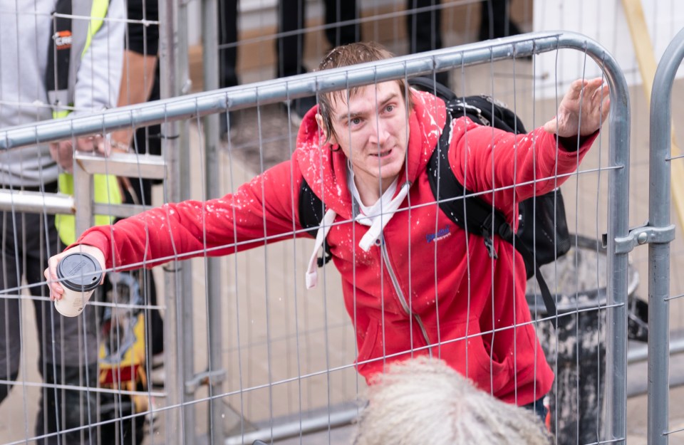 The man in a red hoodie could be heard shouting ‘Scum, scum, scum’