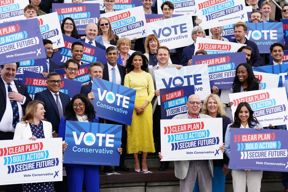 The PM posed for pics with card carrying Conservatives ahead of the launch