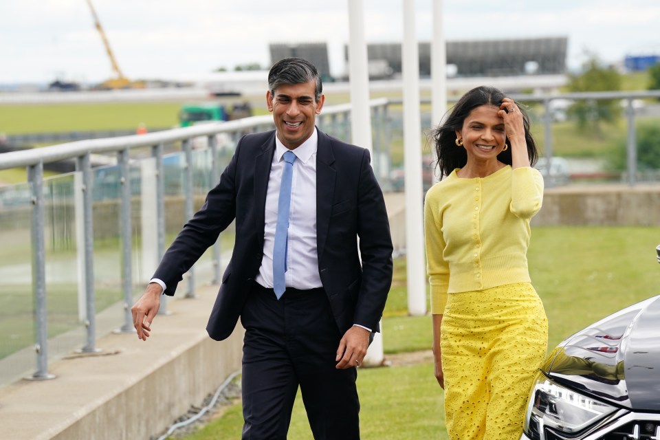 The PM arrived at windy Silverstone racecourse with his wife Akshatha this morning