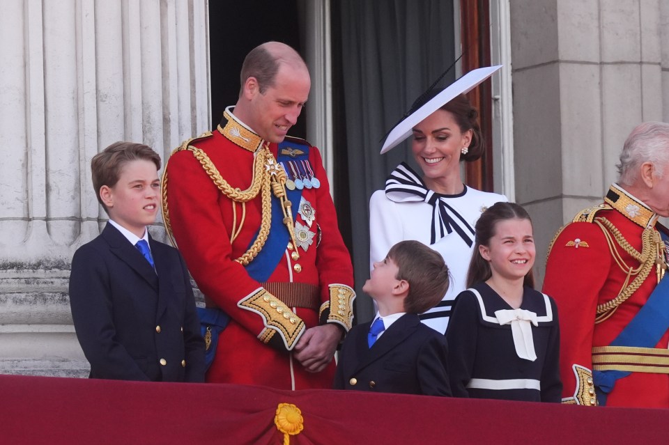 Cheeky Louis chatted away to his mum and dad on the balcony, with George and Charlotte by their sides