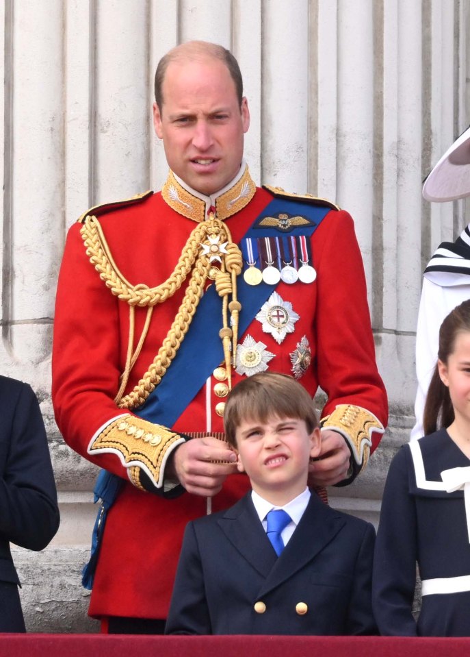 Wills appeared to play with Louis' ears on the balcony