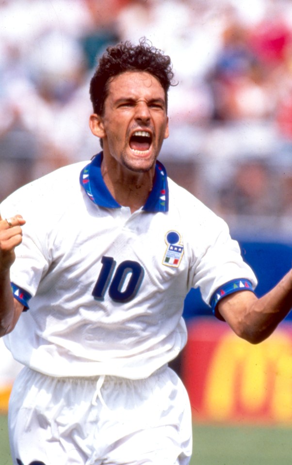 a man wearing a white jersey with the number 10 on it