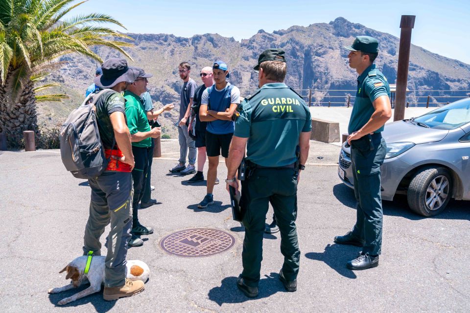 Warren and Zak speaking to Spanish cops and rescuers