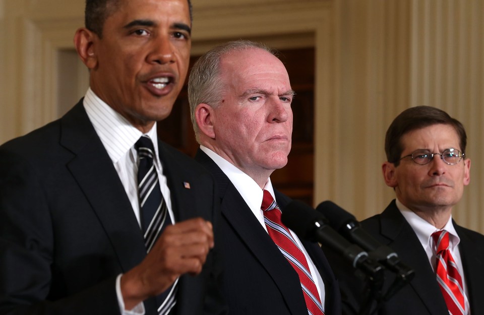 President Barack Obama, left, Security Advisor for Homeland Security and Counter terrorism John Brennan, centre, and CIA Director Michael Morell in 2013