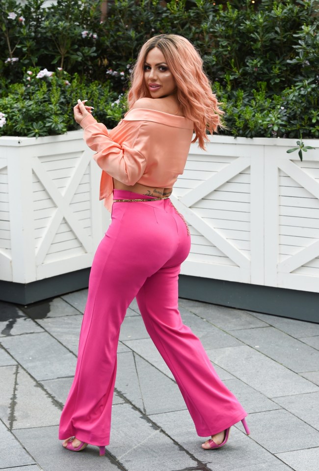 Holly, pictured in 2019, is attempting to reduce the size of her bum after giving birth