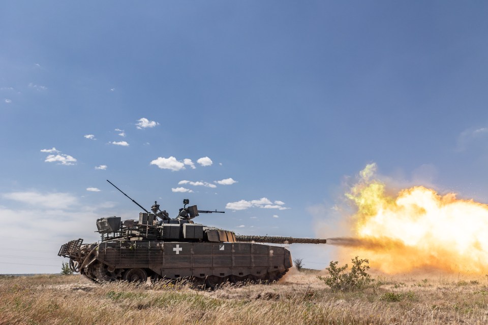 A Ukrainian military tank fires as the war continues in Donetsk Oblast