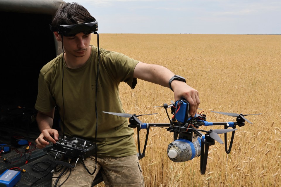 A Ukrainian serviceman of the Sky Hunters unit of the 65th brigade operates a drone on the front line in Zaporizhzhia region, Ukraine