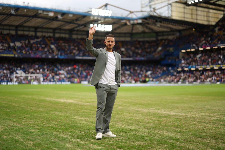 Eden Hazard standing on the poor pitch