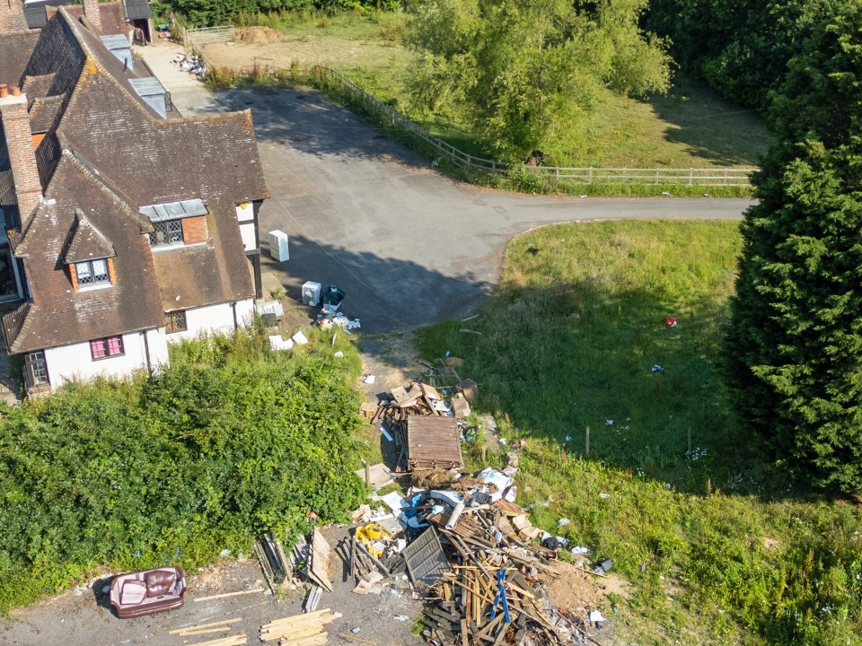 New pictures show piles of rubbish left discarded around Katie's former home as it lies empty