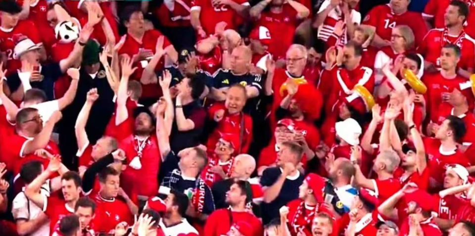 Fans loved the reaction of the Scotland fan in front of him