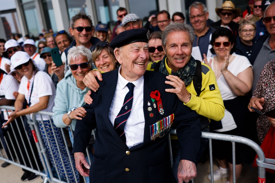 The crowd hailed the veterans – the last of the generation that saved the world