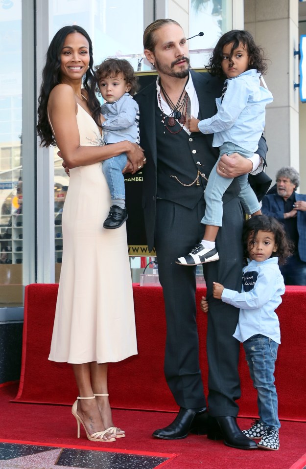 Zoe with husband Marco and their children, Cy ­Aridio and Bowie Ezio and Zen