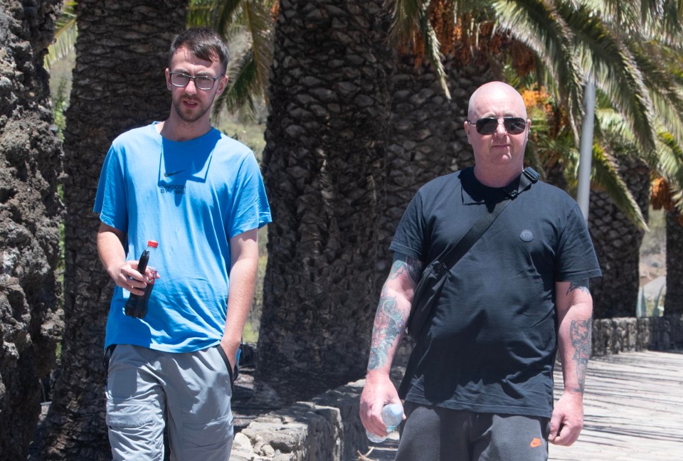 A distraught Warren with Jay's older brother Zak scouring Tenerife for any trace of Jay