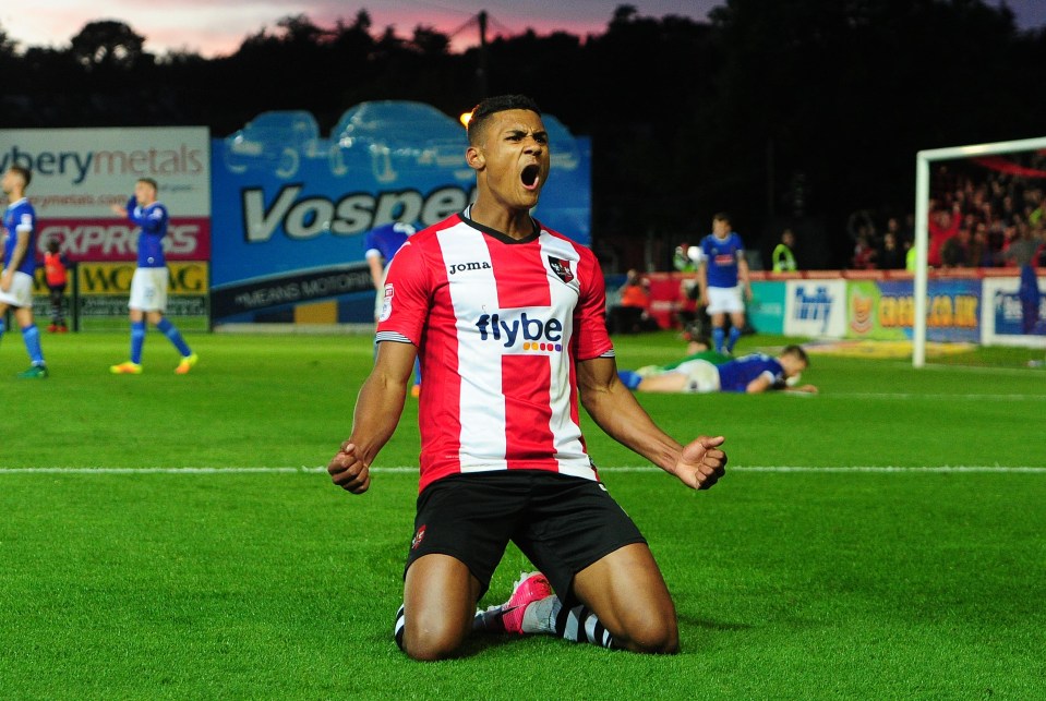 Watkins celebrates after scoring for Exeter in 2017