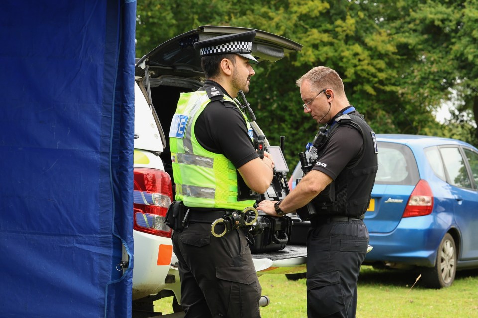 Police are seen at Stocking Farm, formerly known as Rooks Farm, in Stocking Pelham, Hertfordshire during the dig