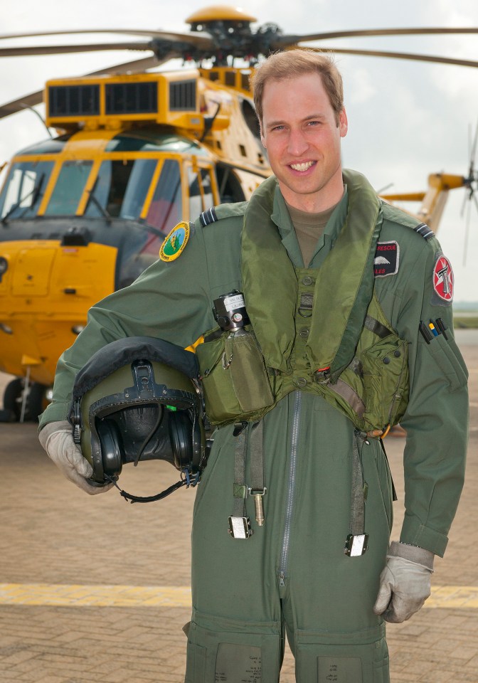 Wills, 42, poses in front of a Sea King helicopter in 2012