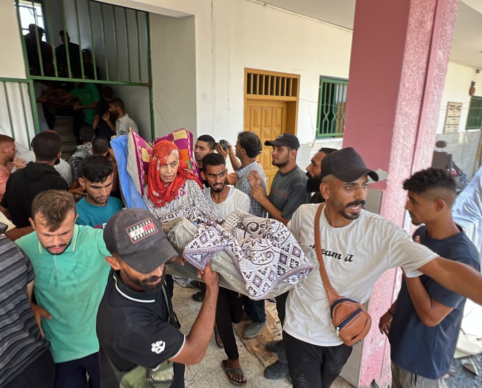 Civilians were seen helping the wounded and carrying them to safety