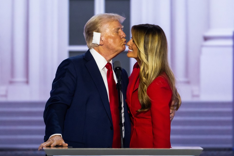 Donald Trump and wife Melania in what one caption writer dubbed a ‘tender embrace’