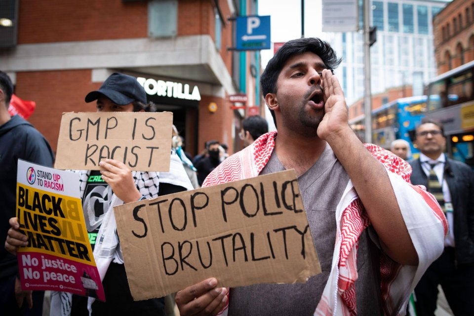 Protesters on the streets of Manchester following the disturbing video