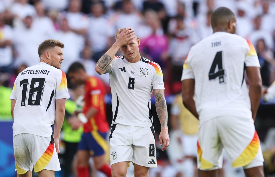 Kroos looks on in heartache