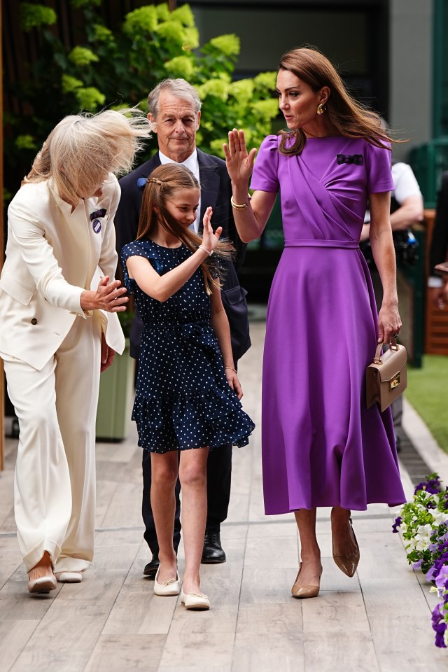 The Princess of Wales donned her traditional purple-and-green bow