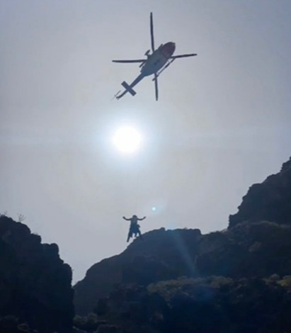 The moment rescue workers appear to perform a helicopter airlift in the area where a body was found in the hunt for Jay Slater