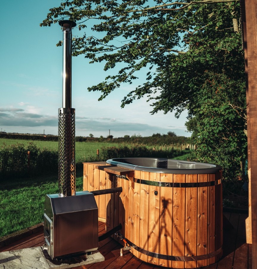 The elaborate shed conversion has its own sauna, hot tub and viewing deck