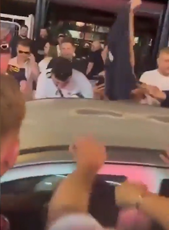 England supporters were seen slapping the man’s car as he tried to drive past