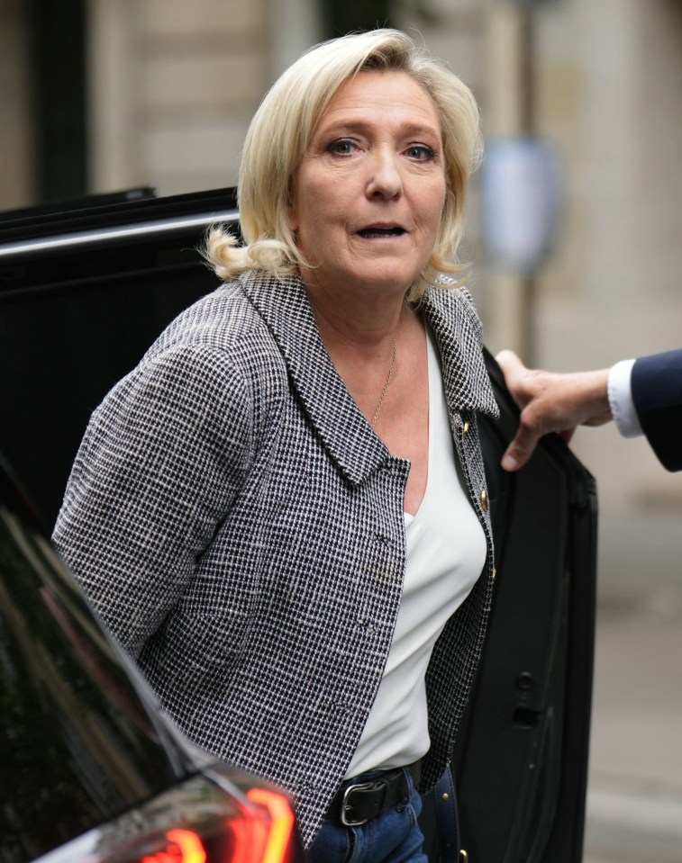 Marine Le Pen arrives at the far-right Rassemblement National (RN) party headquarters in Paris on July 8