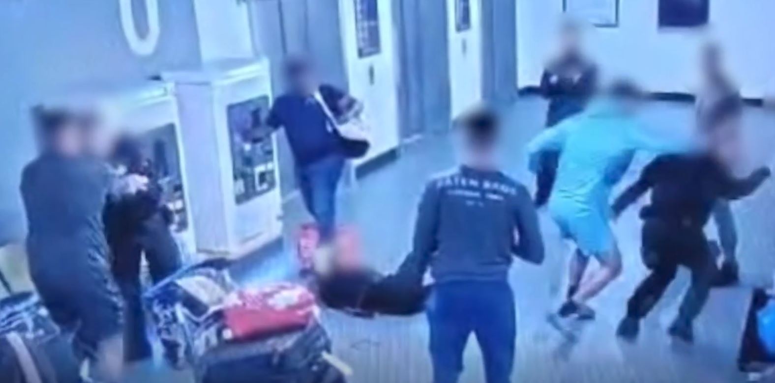 The same video also showed a man punching a female cop in the face several times (R)