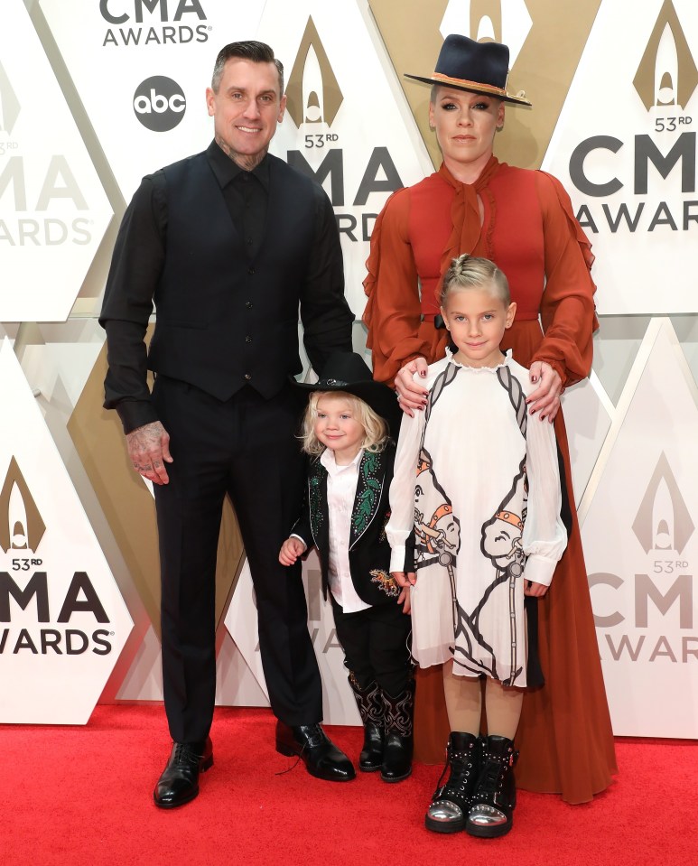 Pink is pictured with her husband, Carey Hart and their children