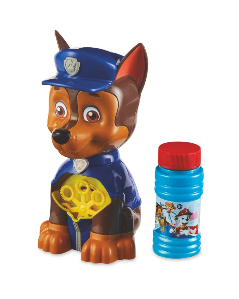 a paw patrol toy with a bottle of bubbles next to it