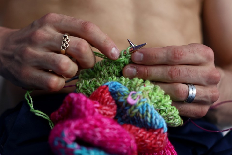 Tom knitted pouches for his Team GB teammates to hold their medals