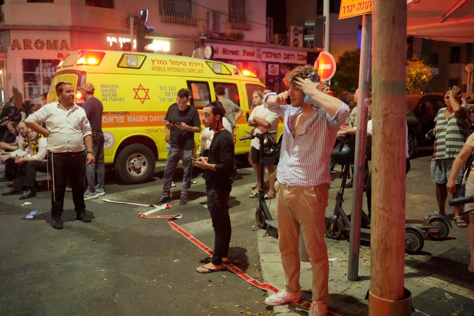 Residents were left on the streets after the blasts ripped through Tel Aviv