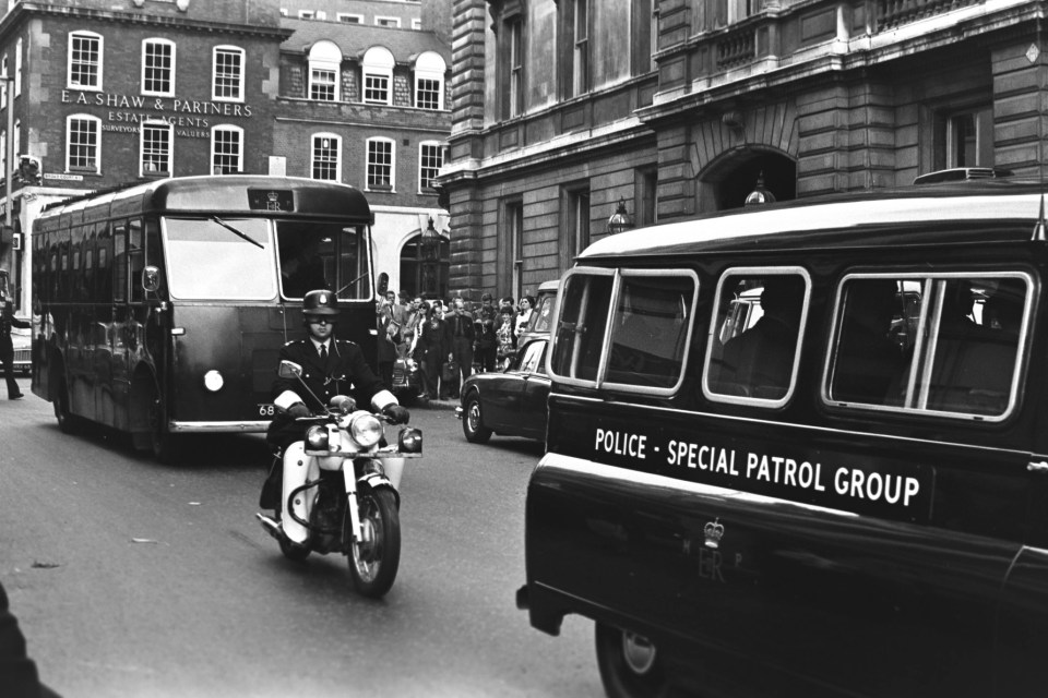 Kray Brother at Bow Street Police Courts. The Kray brothers and 15 other men appeared at Bow Street police court this morning of a number of charges. Two of the men, Reginald Kray and Albert Joseph Donaghue - are accused of murdering "Mad axe man" Frank Samuel Mitchell at some time on or about December 23rd 1966. A Police van of the Special Patrol Group land motorcycle Police leaving court this morning ahead of the coach carrying the accused. 14.06.1968