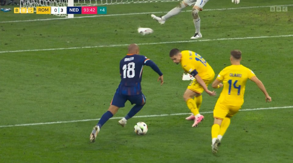 Romania goalkeeper Florin Nita kicked another shoe away before Malen's strike