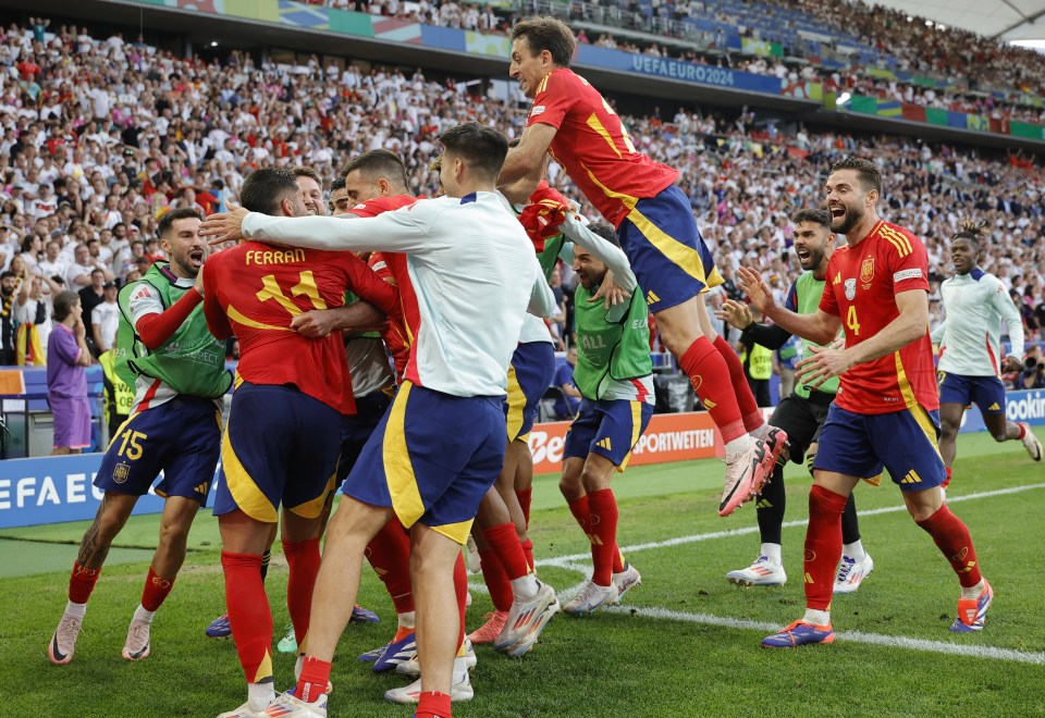 Spain celebrate heading into the last four