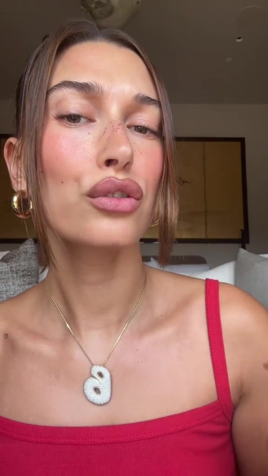 She outlined her pout first, and then used Rhode Skin Peptide Lip Tint in the middle