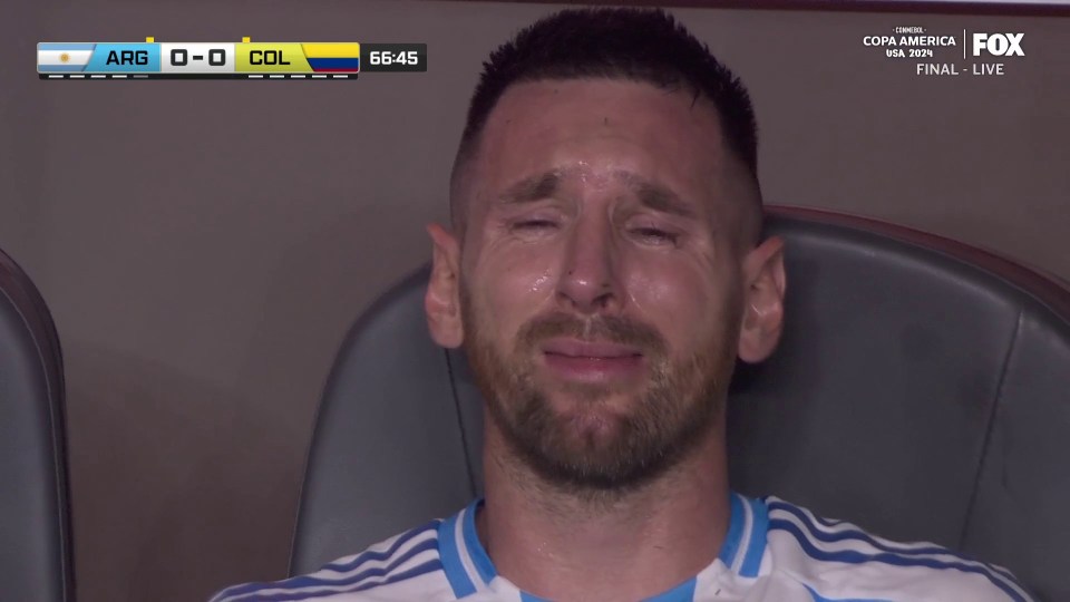 a man is crying while watching a soccer game on fox