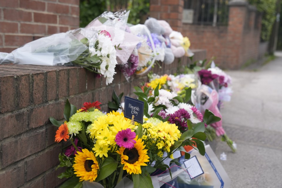 Flowers and tributes laid near the scene of the crash on the A61 in Wakefield