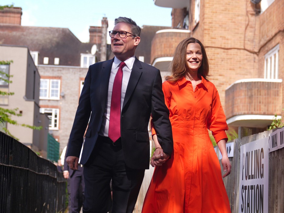 Sir Keir Starmer and his wife Victoria on their way to cast their votes in the General Election