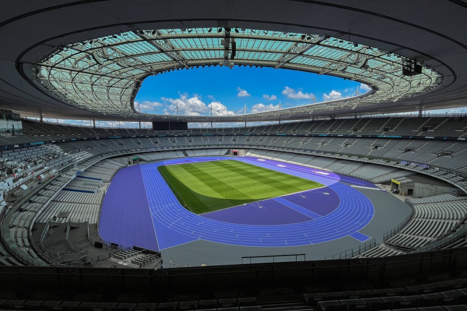 (FILES) This photograph shows a general view of the new track of the Stade de France, the Olympic Stadium of the Paris 2024 Olympic and Paralympic Games, in Saint-Denis, North of Paris, on May 7, 2024. The 2024 Paris Olympic Games are set to begin with an unprecedented open-air ceremony on the river Seine on July 26, 2024, as most concerns so far relate to security arrangements for the opening festivities. (Photo by Martin BUREAU / AFP) (Photo by MARTIN BUREAU/AFP via Getty Images)