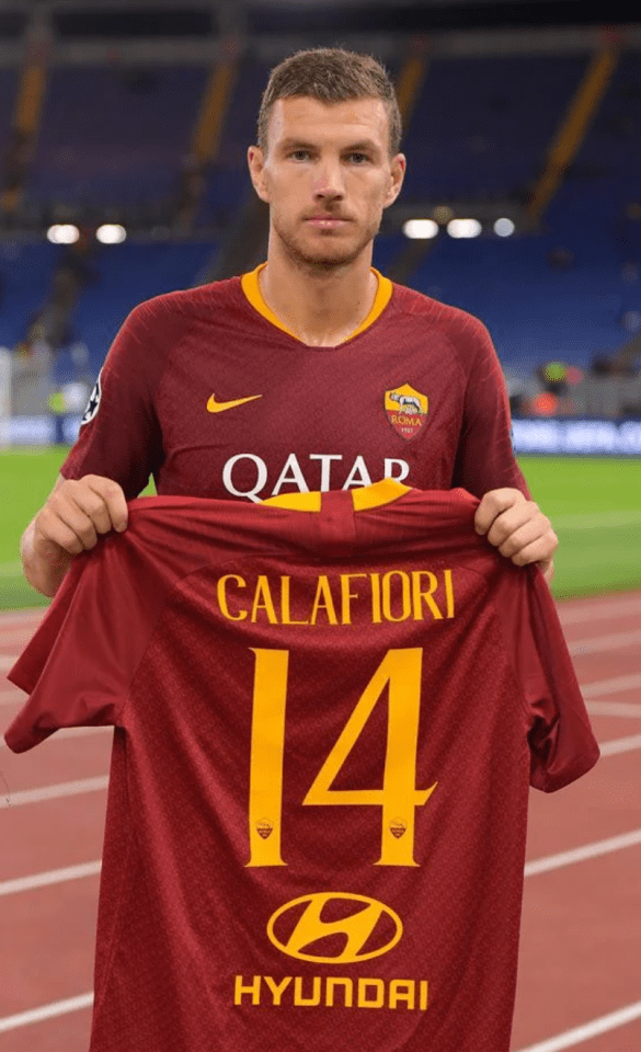 Edin Dzeko holds Calafiori’s jersey aloft after scoring for Roma