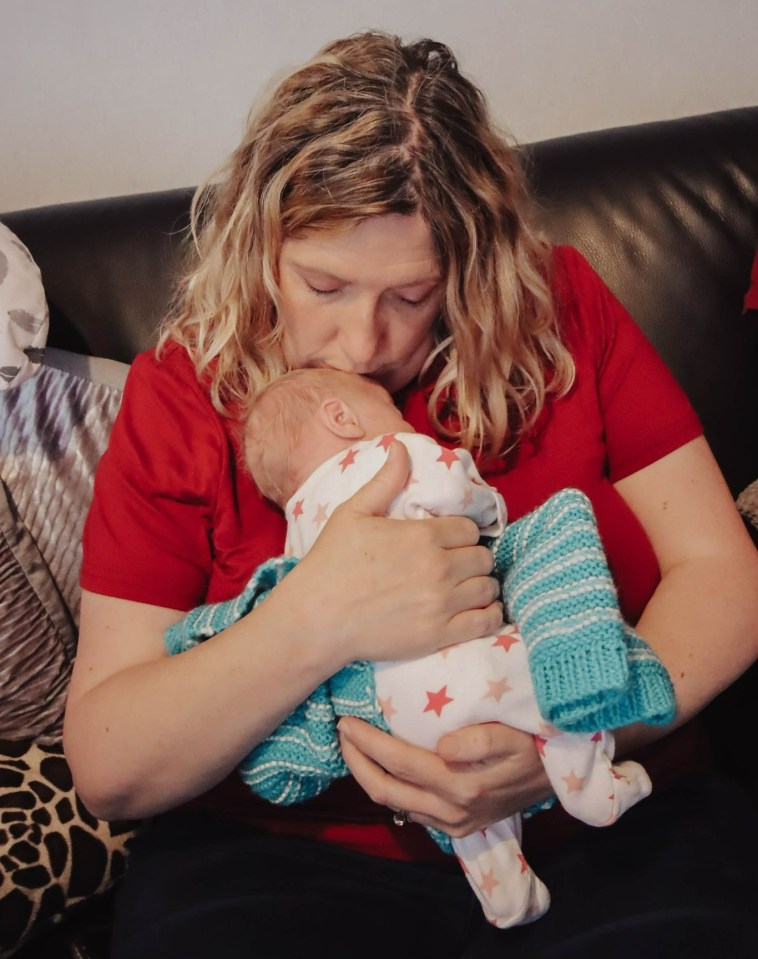 Laura Johnstone holding her baby girl Amelia